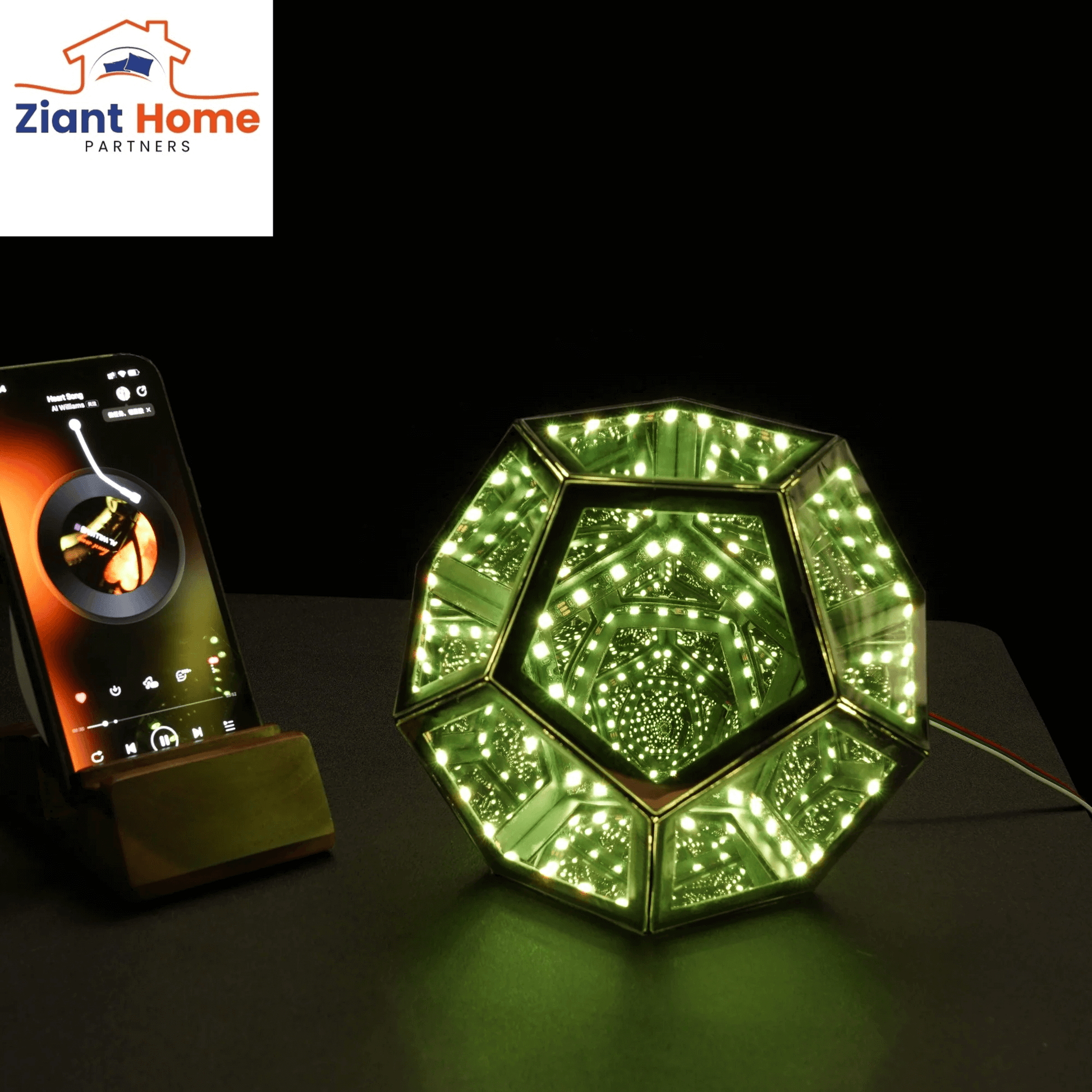 Infinity Ziantful Magic Table Lamp glowing green next to a phone on a stand, showcasing its mesmerizing multi-color light effects.