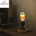 Retro light base with glowing bulb in loft style for elegant home decor, by Ziant Home Partners